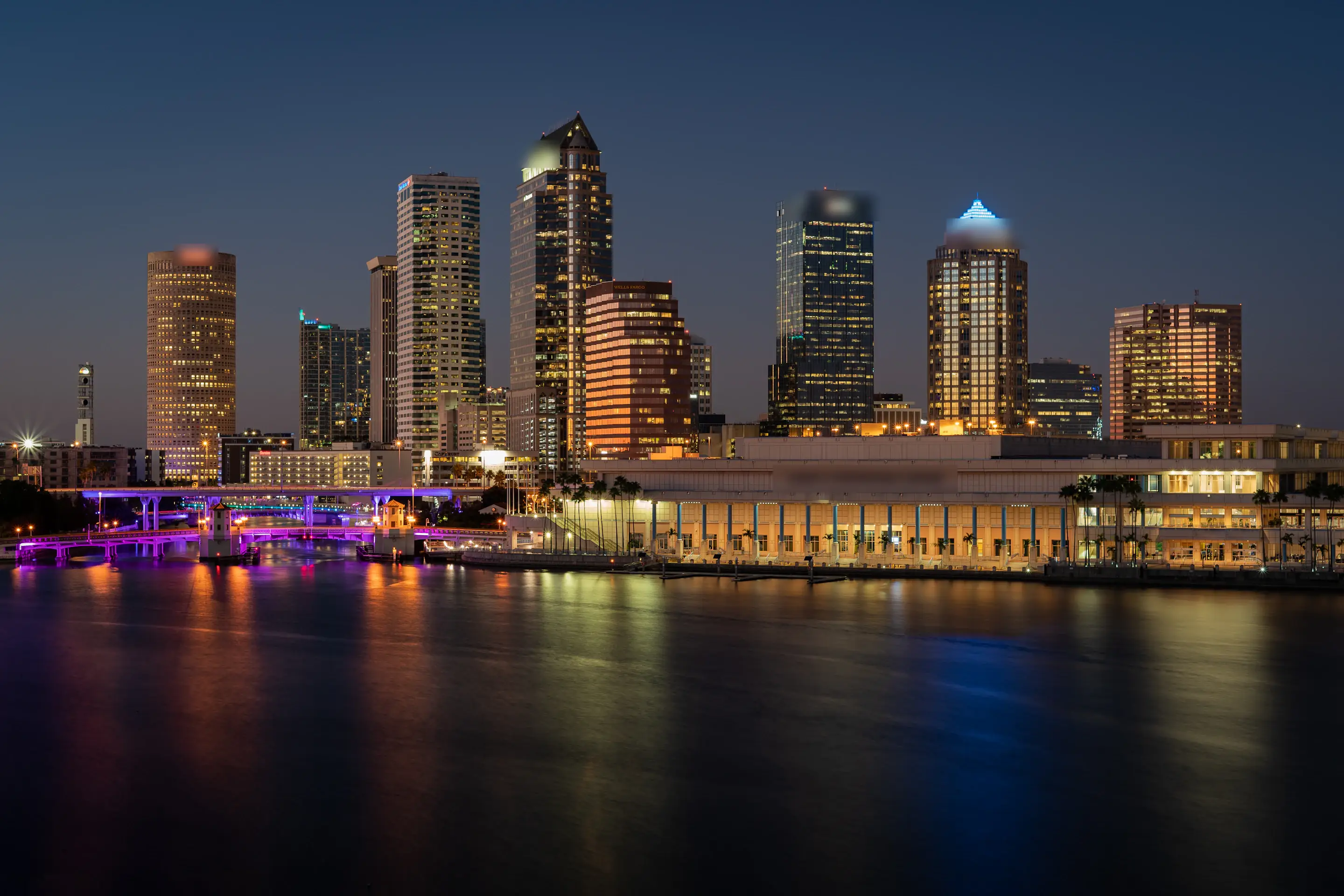 Downtown Tampa skyline reflected in the river at dusk